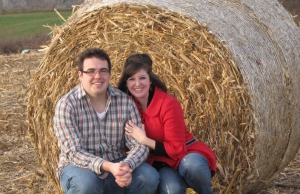 Christian and woman by a haystack